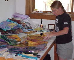Cindy working in the studio making a quilt
