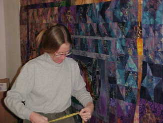Cindy in the studio, designing a quilt